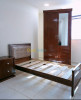 Chambre individuelle en bois rouge 