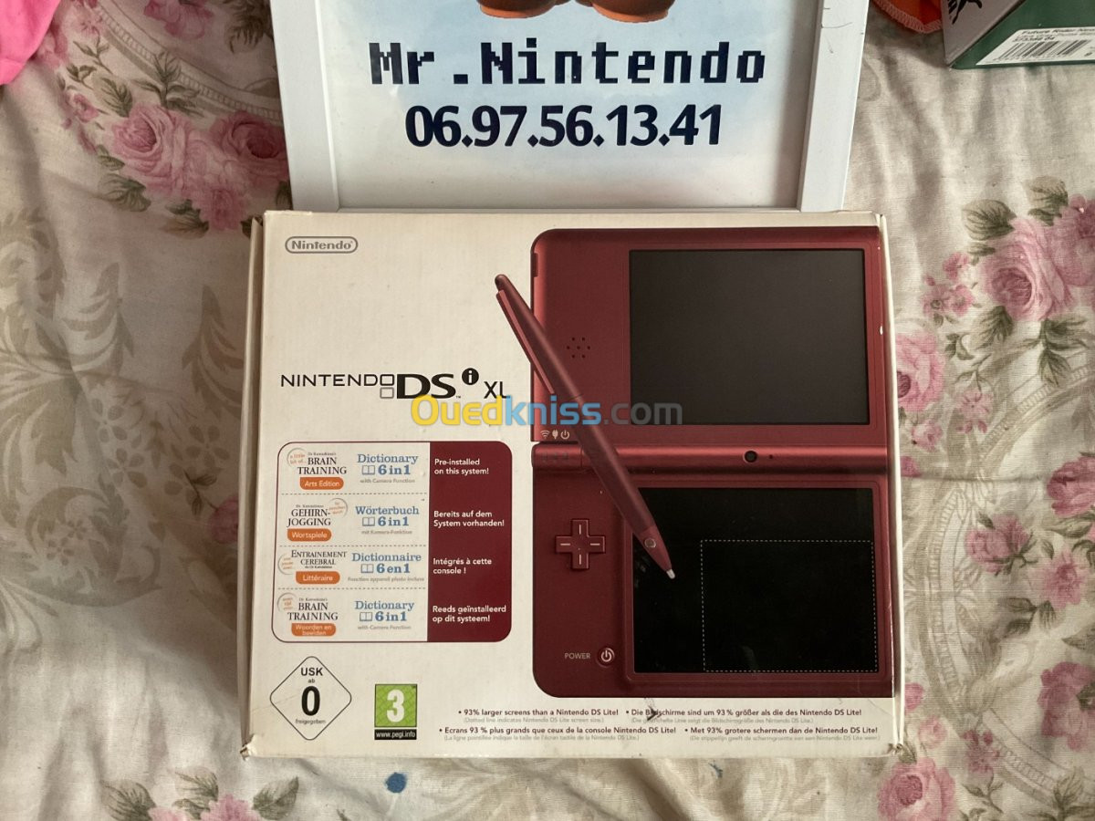 DSi XL en boite + 6 Jeux 