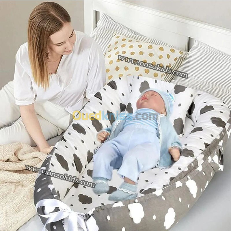 Nid bébé double face avec oreiller et drap