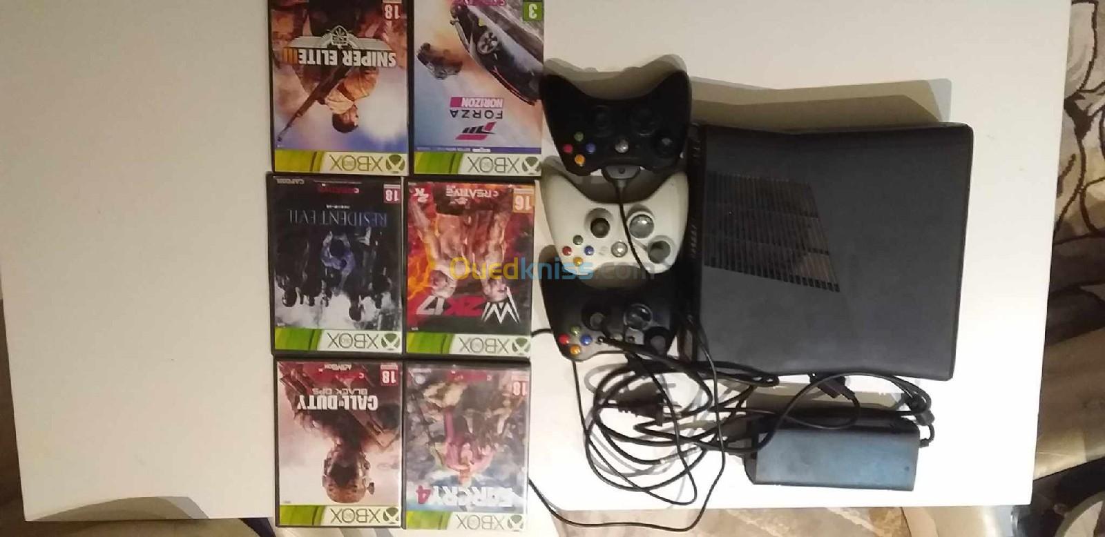 Xbox 360+7cd+3 bras.