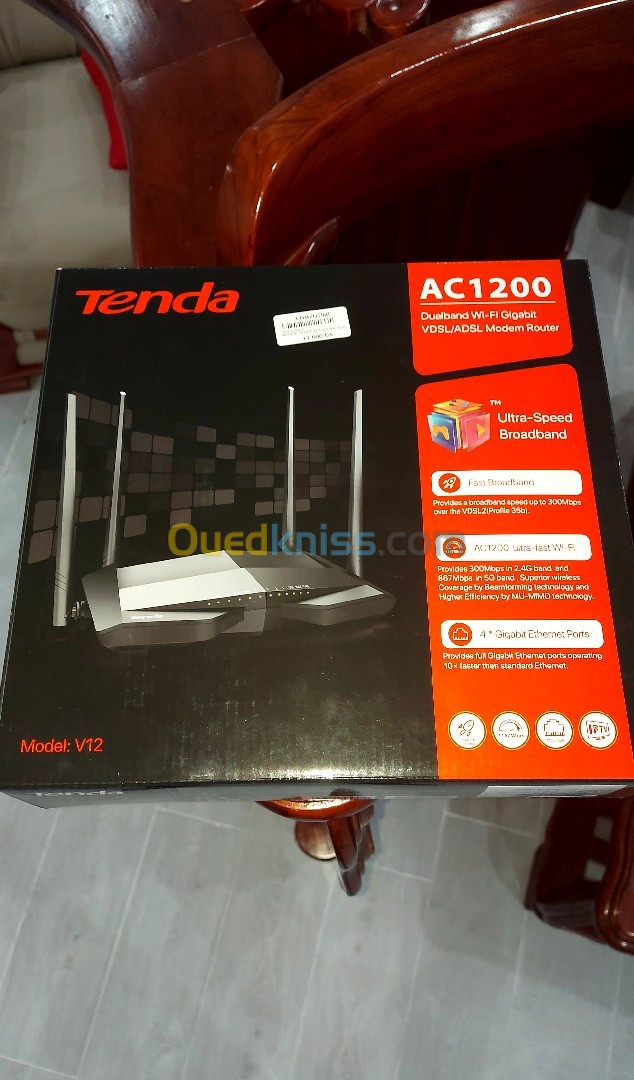 Modem TENDA AC 1200 V12 dual band VDSL/ADSL Modem Router en très bon état prix 11 500 DA négociable 