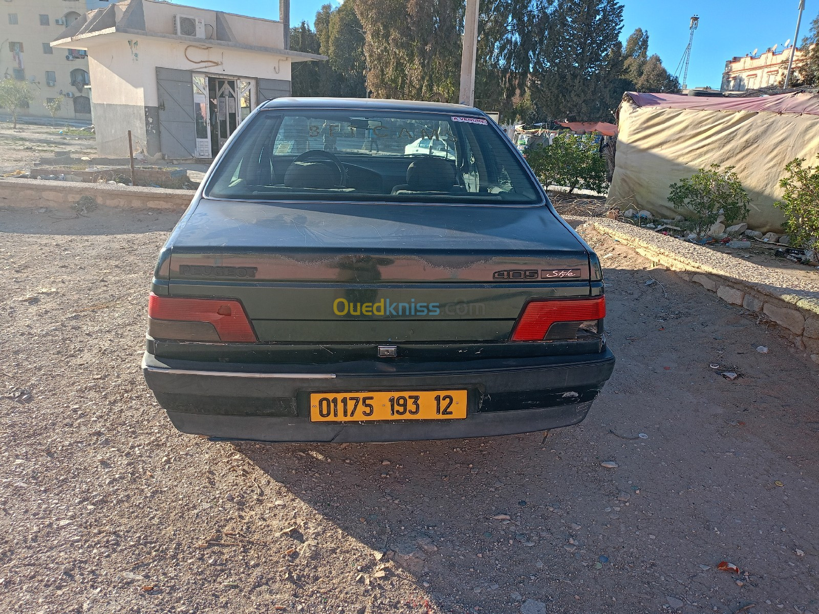 Peugeot 405 1993 لون اخضر داكن املكها منذ   2004الى يومنا هذا