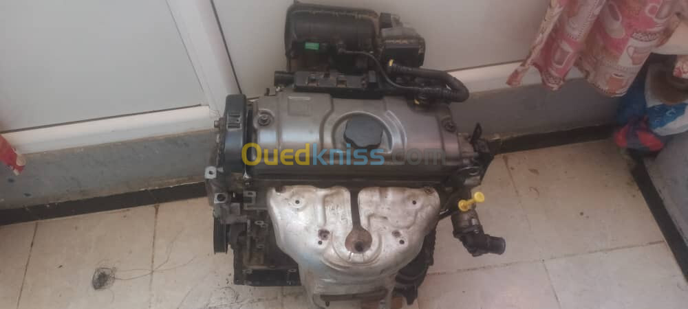 Moteur Peugeot 1.4 essence simple75 cheveux 