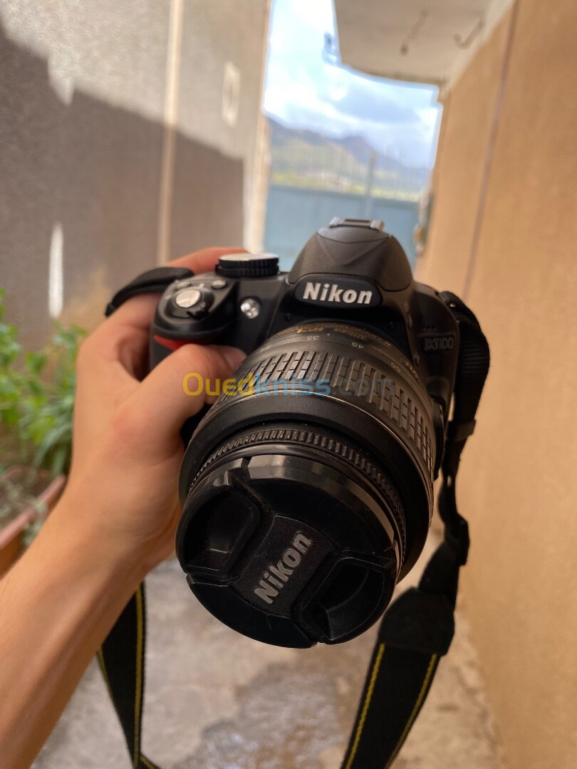 Nikon D3100 18-55mm click 11K