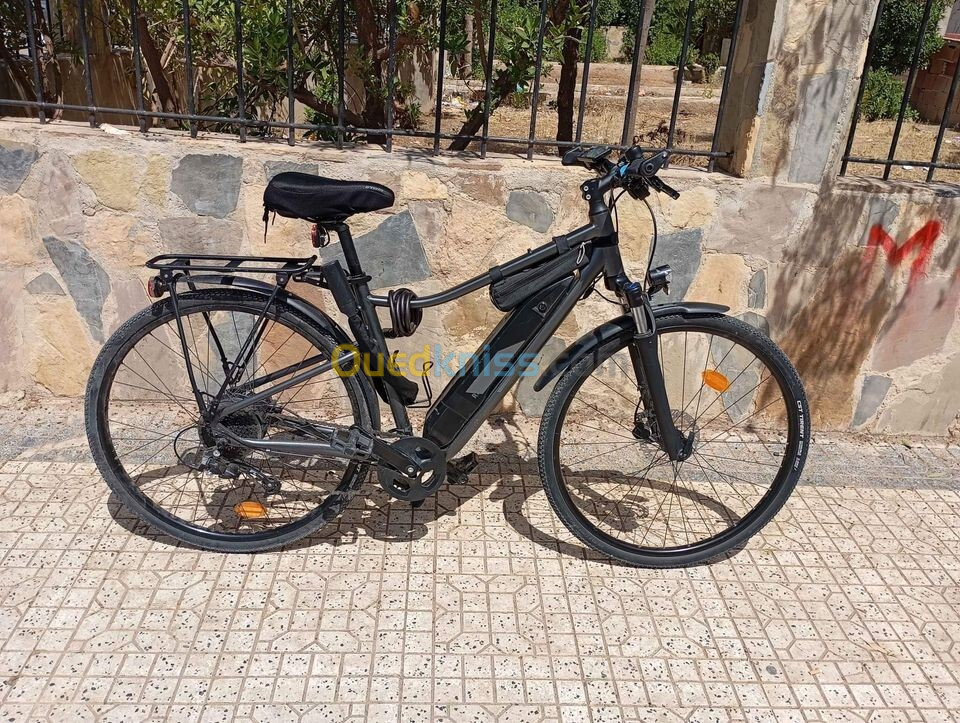 Vélo tout chemin électrique cadre haut- Riverside 520 E avec chargeur