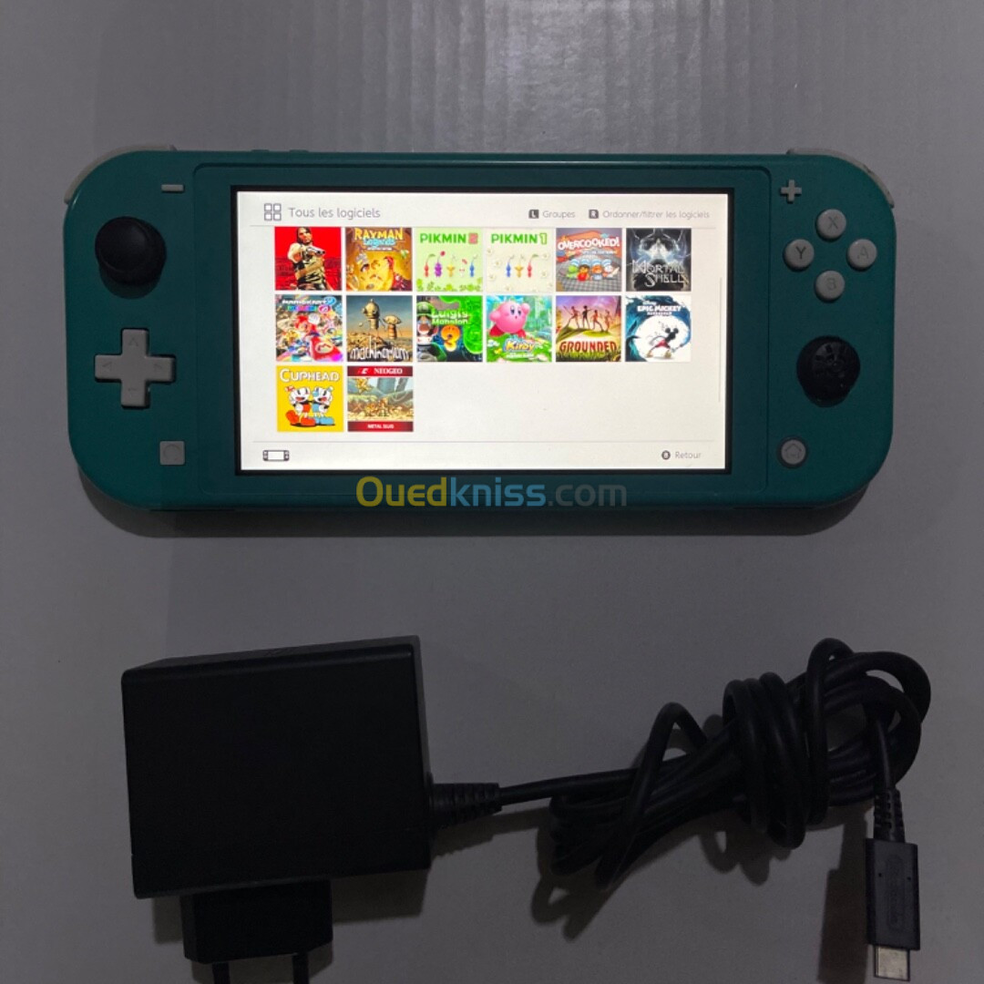 Nintendo switch lite flashé (puce) avec chargeur original 