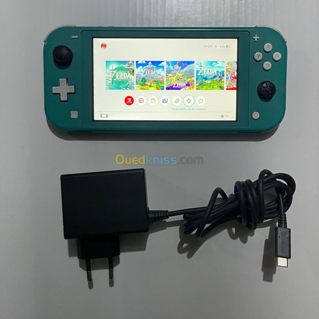 Nintendo switch lite flashé (puce) avec chargeur original 