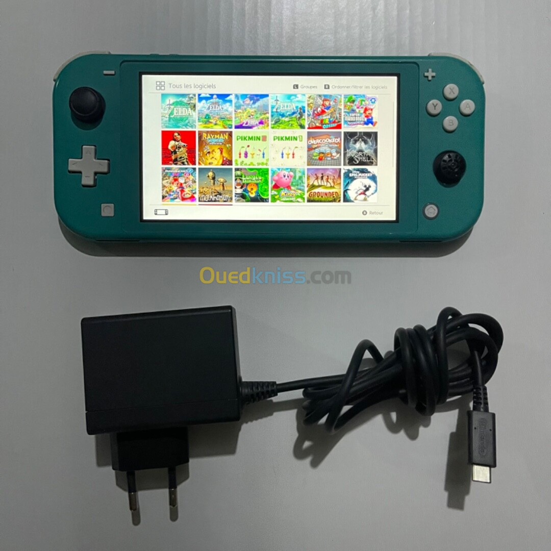 Nintendo switch lite flashé (puce) avec chargeur original 