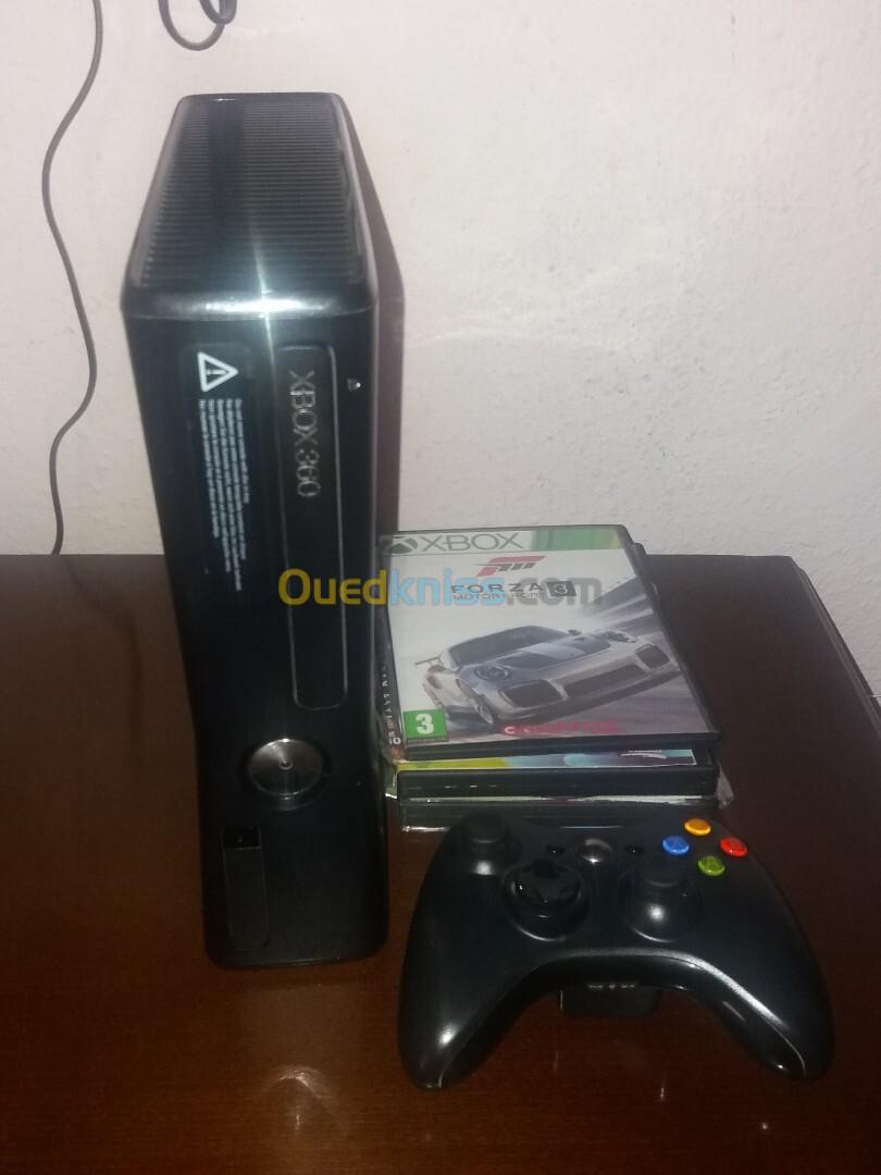 xbox360 slim+1 manette sans fil+ 11 CD de jeux