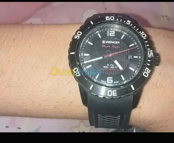 WENGER  BLACK NIGHT SWISS MADE  7aja chaba  Temchi 7eta100m ta7t lma