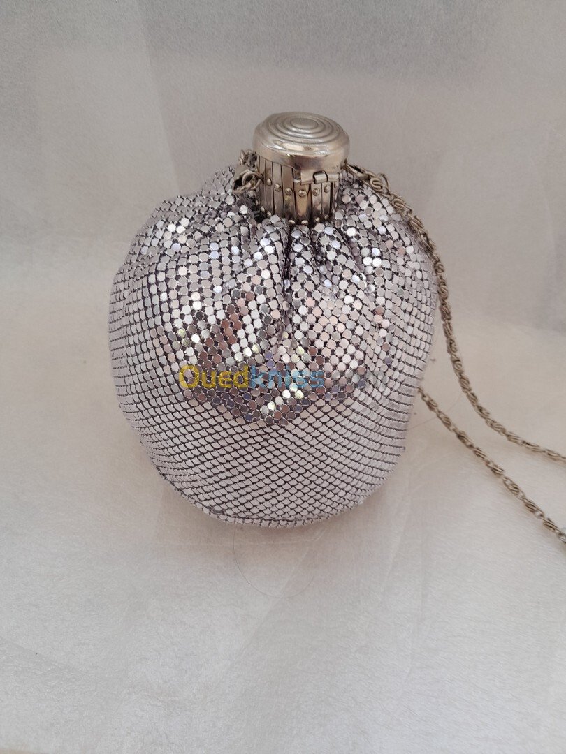 Pochette soirè argent  بوشات سواغي اغجو 