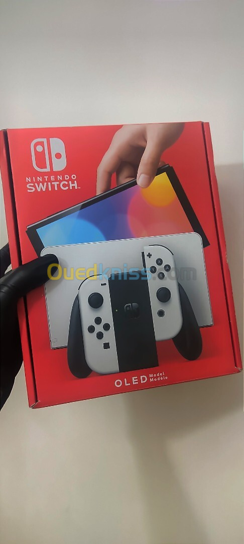 Nintendo Switch Oled 2023 + Cartouche Payday 2 + 2 capuchons