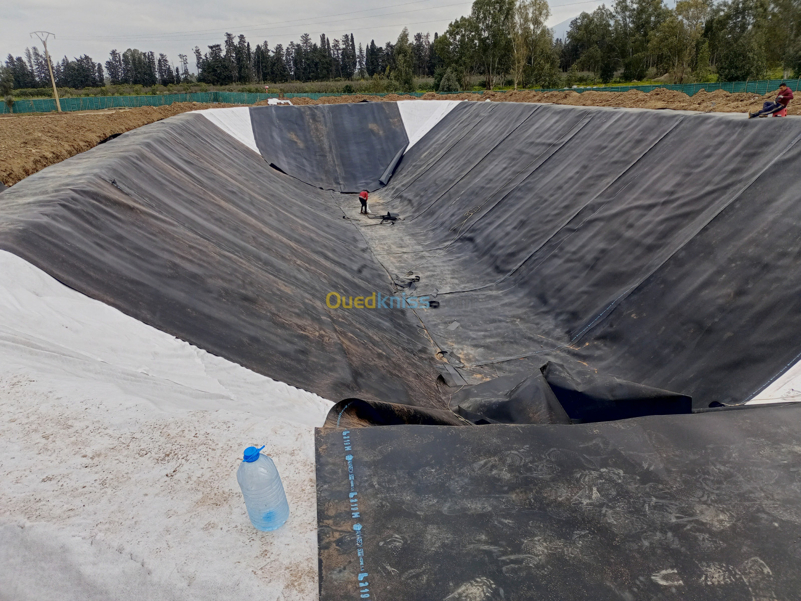 Réalisation des bassins geomembrane