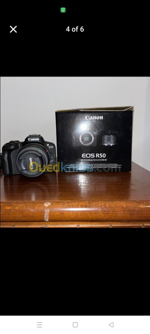 Camera canon r50 neuf avec objectif + 18-45mm IS STM KIT  + Carte mémoire 128 la 200