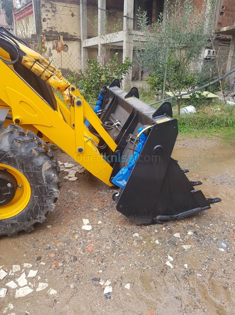 location retro-chargeur jcb+brise roche danda tout neuf 