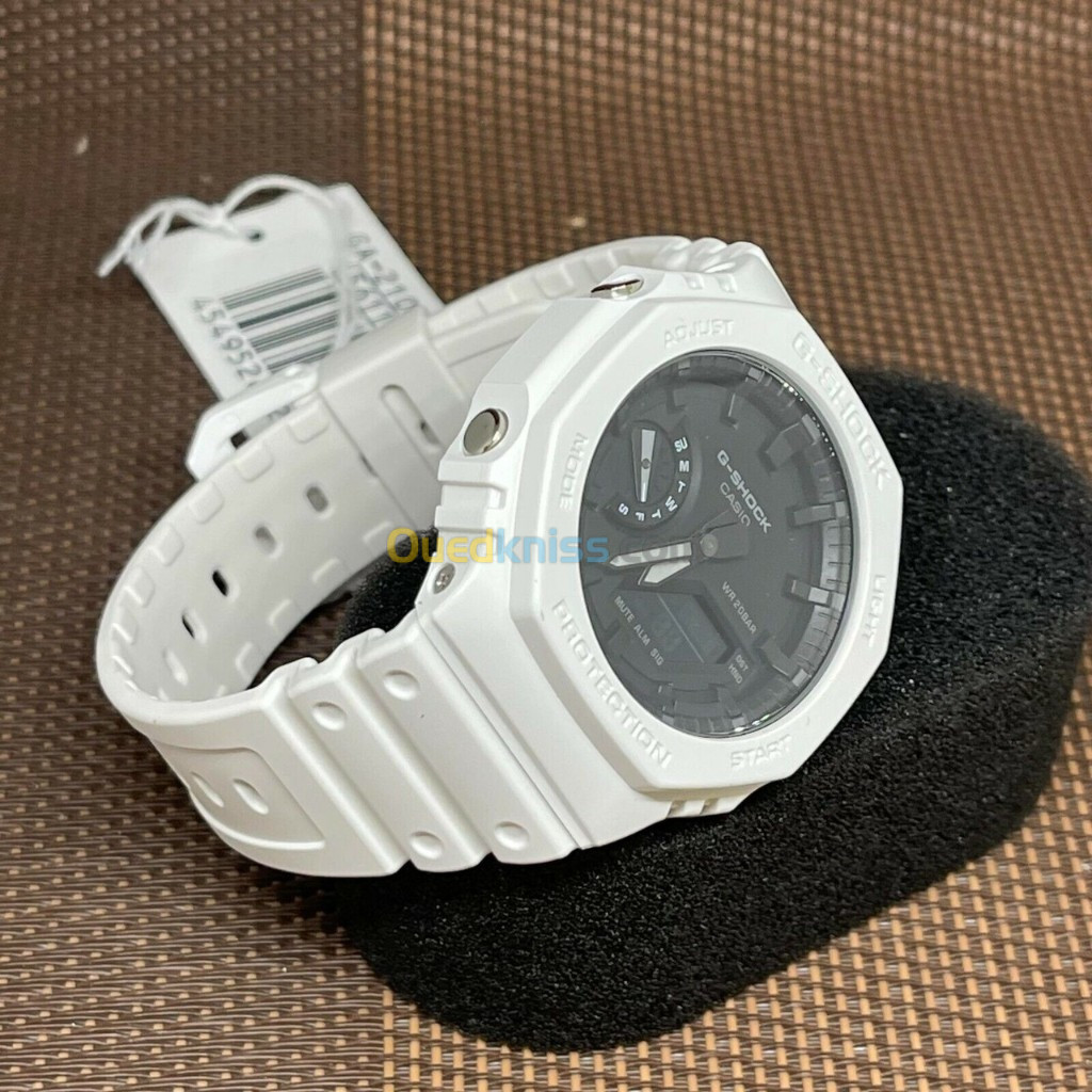 Montre Casio G-Shock Blanche Fond Noir  (التوصيل متوفر 58 ولاية )