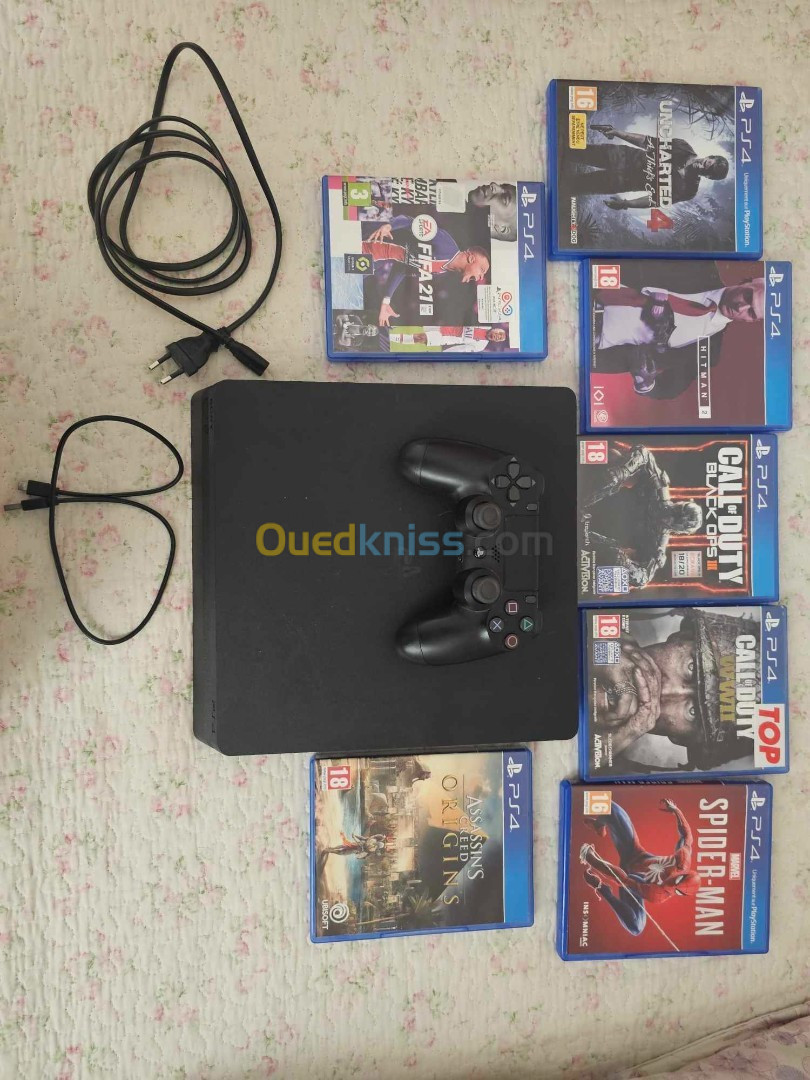 02 PlayStation 4 slim avec jeux