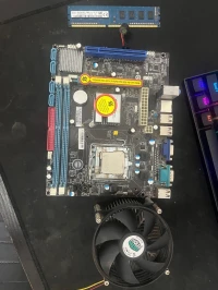 Combo intel pentium + carte mere +ram 2gb+ cooler prix 250alf