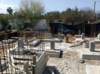 Travaux de constuctions des maisons en beton (dalle . Poteaux. esc