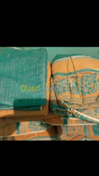 البليدة-الجزائر-مفارش-أسرة-و-أقمشة-منزل-ستائر-serviettes