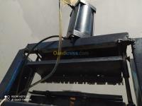 ورشات-عمل-machine-pneumatique-raclette-press-برج-الكيفان-الجزائر