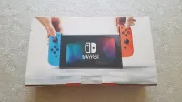 NINTENDO SWITCH FLASHÉE EXCELLENT ÉTAT AVEC BOITE ET ACCESSOIRES 