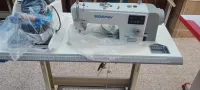 Machine a coudre آلة خياطة 