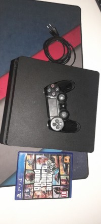 أجهزة-ألعاب-الفيديو-ps4-slim-500-go-version-1352-plus-cd-gta-5-عين-بنيان-الجزائر
