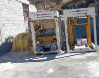 Machine hourdis et parpaings automatique 
