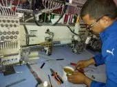reparation machine broderie eléctroniq