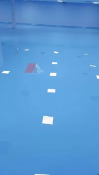 Revêtement de sol en résine epoxy et ponçage du béton et étanchéité liquide 
