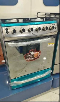 Cuisinière Géant Queen 4 feu inox et miroir 