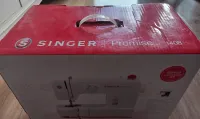 Vente une machine à coudre Singer Promise 1408