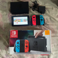 autre-nintendo-switch-flashe-32gb-etat-910-avec-boite-dock-chargeur-support-plein-des-jeux-oran-algerie