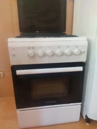 cuisiniere THOMSON 4 feu a gaz