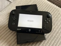 Nintendo Wii U en très bon etat avec 15 jeux 
