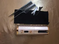 مكواة تجعيد الشعر 