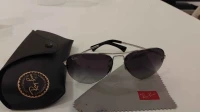 Ray Ban gris argenté monture poli argent
