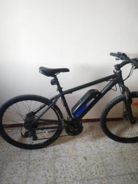 فيلو إلكتريك هابطة من فرنسا مع شارجور تاعها والمفتاح تاع الباطري vélo électrique avec chargeur 