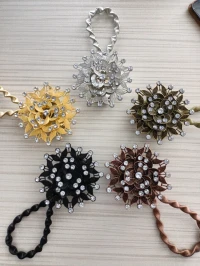 Pince a rideau magnetique avec perle grand modele