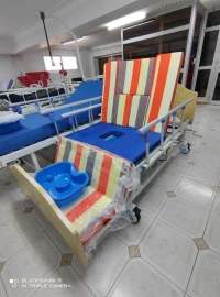 Lit médicalisé multipositions  garde robe pour soins  a domicile 