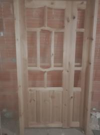 مواد-البناء-porte-salon-en-bois-rouge-باب-من-خشب-أحمر-وهران-الجزائر