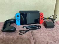 Nintendo switch Oled n9iya Flache + 40 jeux  + toute accessoires