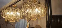 plusieurs très beaux lustres dorés de 12 bras pour 6 lampes