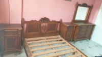 Chambre à coucher bois rouge  