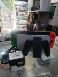 Nintendo Switch Oled (Flashé / Carte Mémoire 128 GB/ Jeux +accessoires switch) 