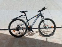 autre-velo-vtt-randonnee-st-120-xl-gris-fonce-orange-fluo-275-skikda-algerie