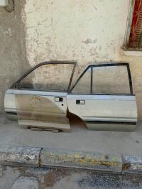 قطع-غيار-المركبات-porte-505-كارو-tapis-capot-moteur-عين-آزال-سطيف-الجزائر