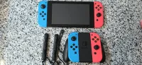 Nintendo switch avec 6 jeux et accessoires 