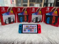 NINTENDO SWITCH OLED FLASHER AVEC PUCE | CARTE MÉMOIRE 64GB | JEUX INSTALLÉS JAMAIS UTILISÉ 